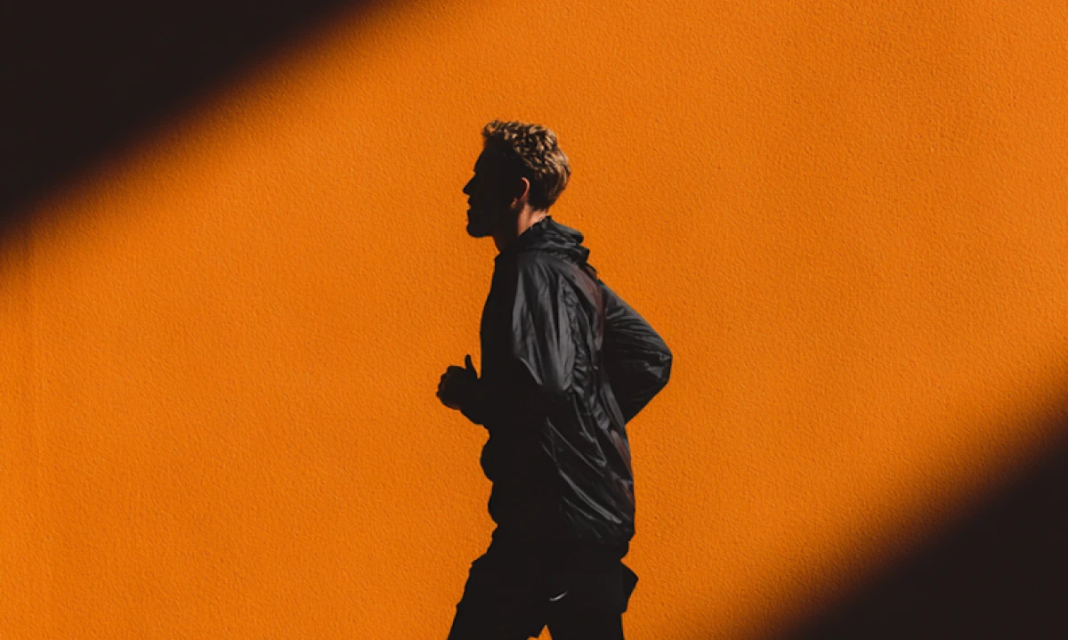 A man running in the sunlight