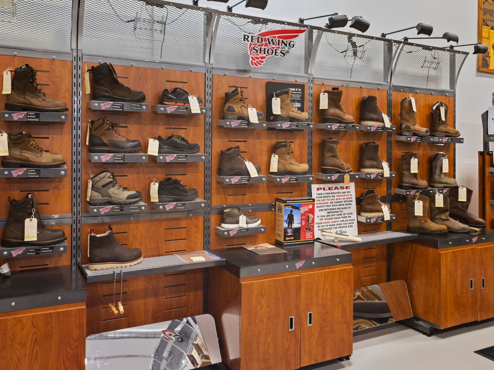 Work boot being fitted in store
