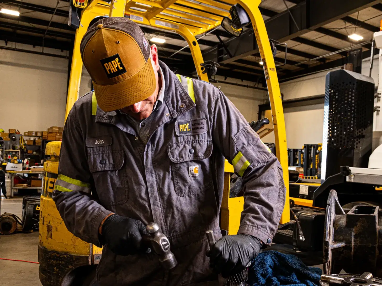 Crew member being fitted for workwear at The Lake's End