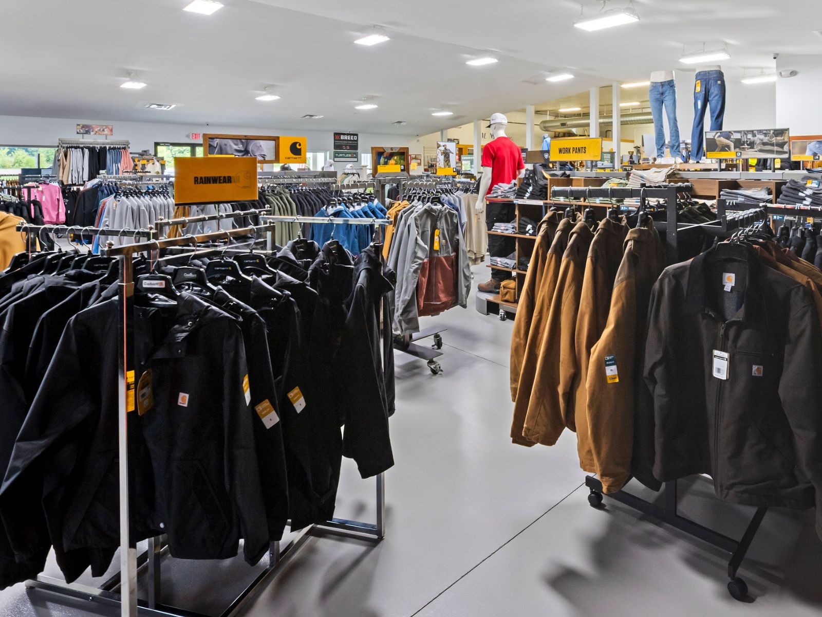 Customer shopping the workwear floor at The Lake's End