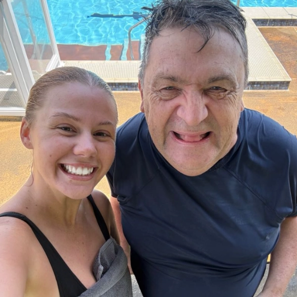 Participant Martin going for a swim with his support worker