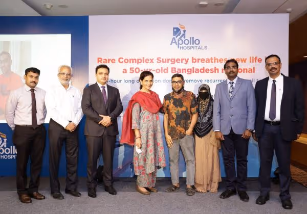 Doctors with a Bangladeshi patient and family after rare chest wall tumour surgery at Apollo Hospitals, Chennai