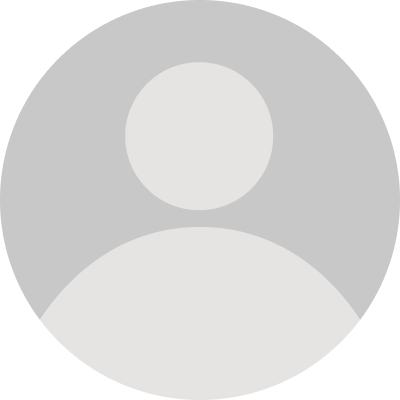 Generic gray user profile icon with a circle for head and shoulders silhouette on a light gray background.