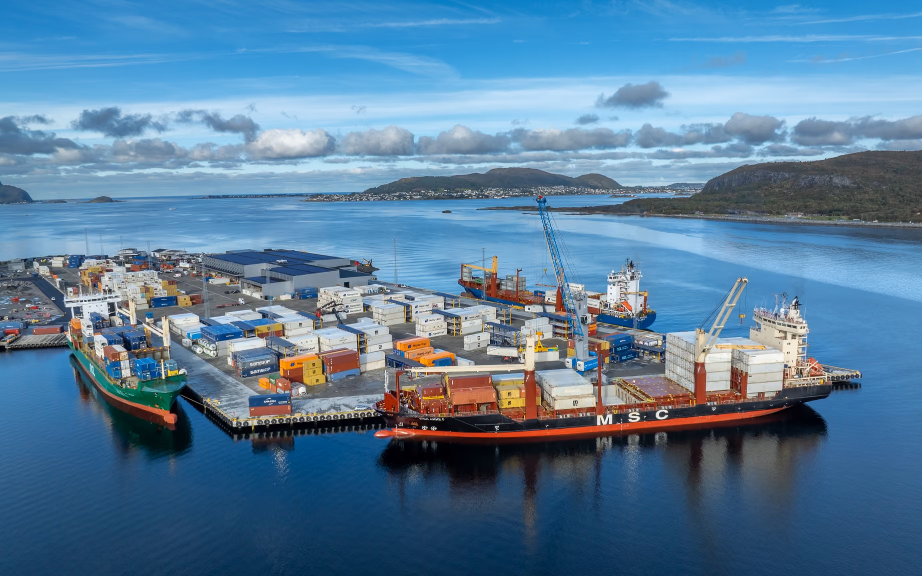 Container ship, cranes and containers at Flatholmen terminal