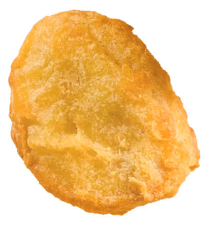 Golden brown crispy chicken nugget with a textured breaded coating.