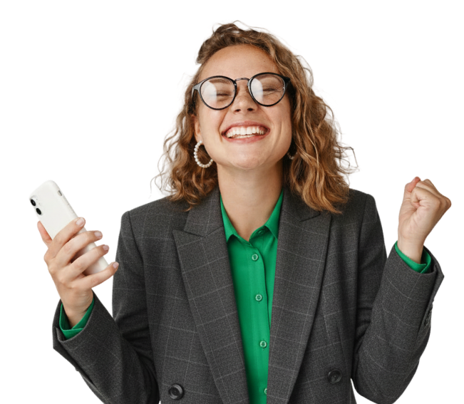 a woman in a suit holding a phone and smiling