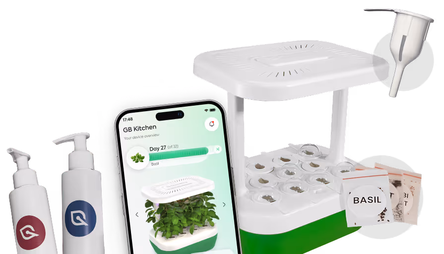 Smart hydroponic indoor garden with basil plants, seed pods, water funnel, nutrient bottles, and a smartphone displaying the gardening app.