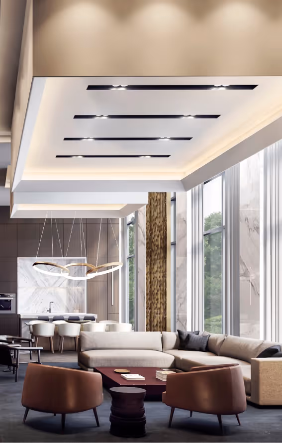 Modern living room with a beige L-shaped sofa, brown chairs, large windows, and unique ceiling lights.