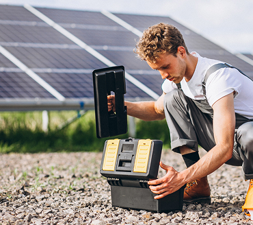 Solar installer fitting solar panels
