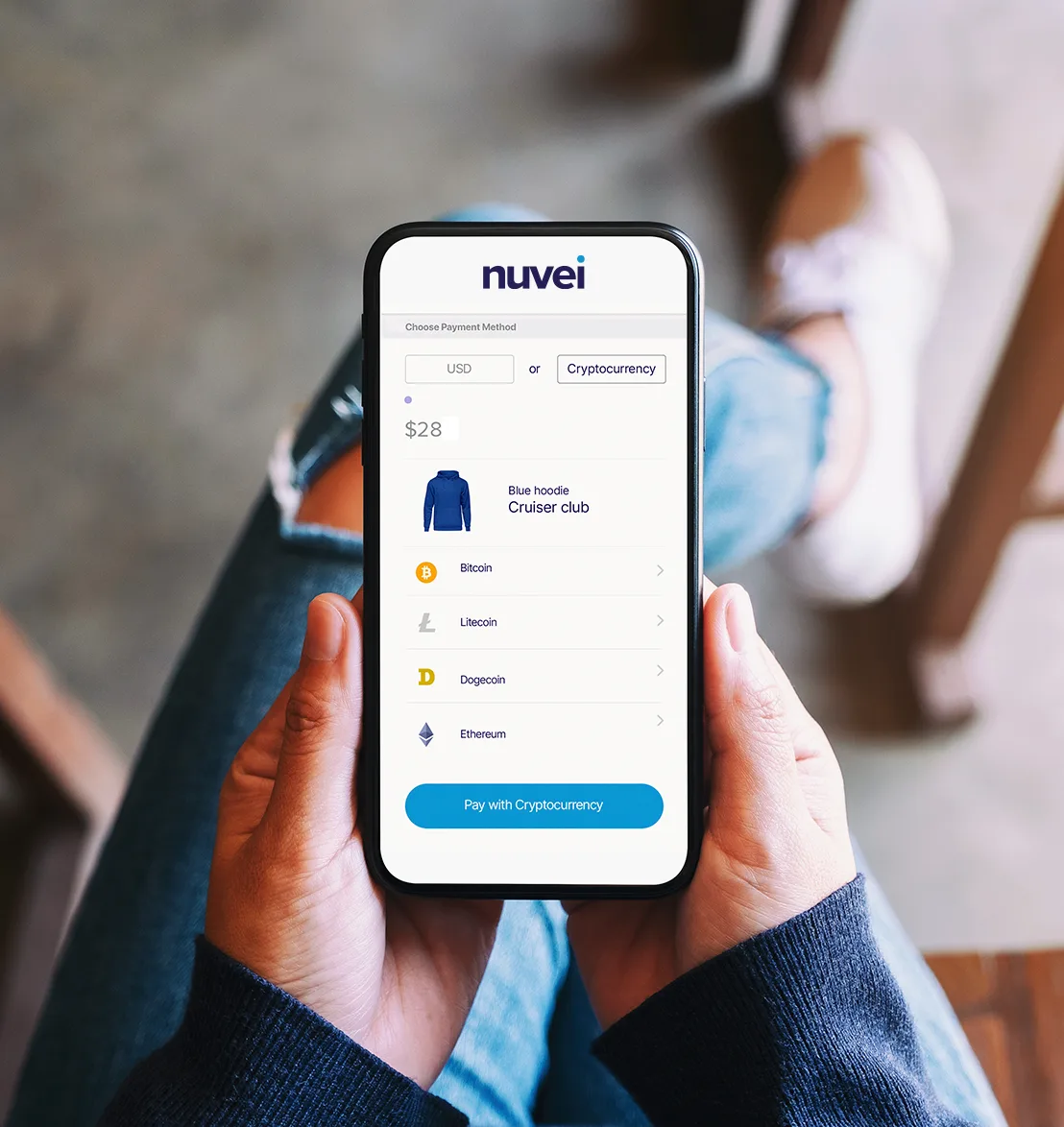 Phone showing a Nuvei checkout with the option to pay with cryptocurrency
