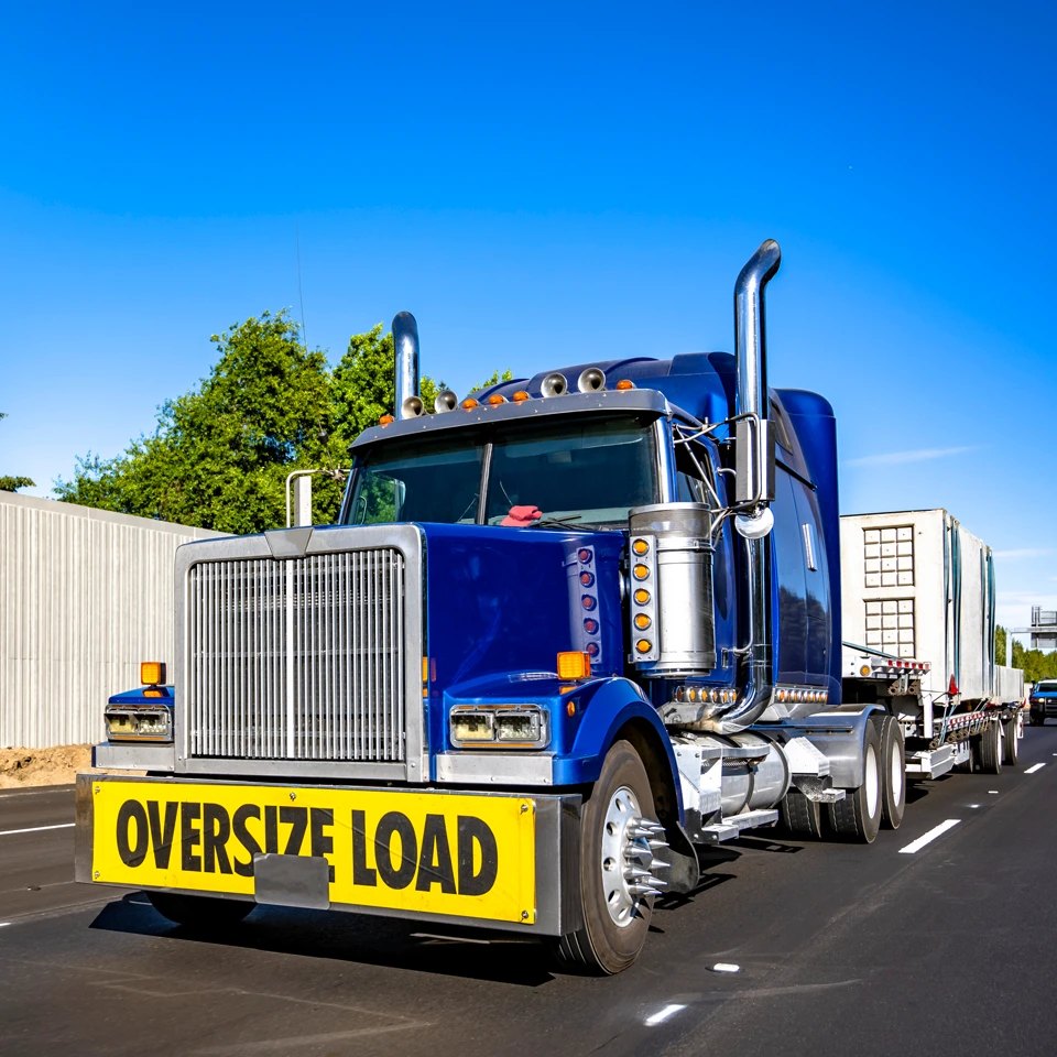 Oversized load on a blue truck