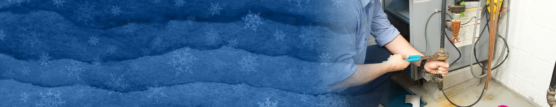 Technician using a wrench to repair a furnace unit connected to pipes in a utility room.