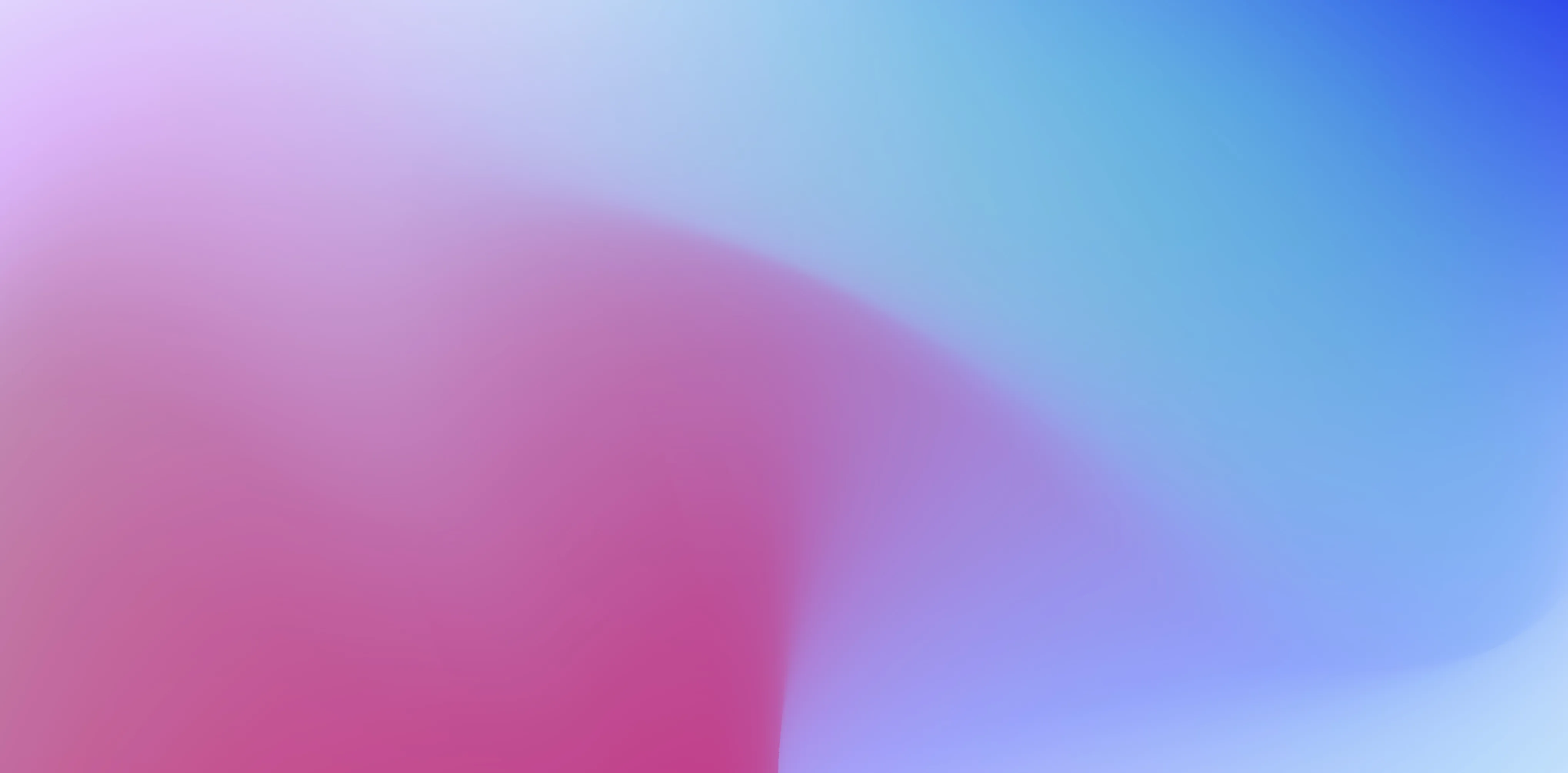 Abstract soft gradient blending pink and blue tones.