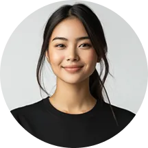 A woman in a black shirt smiling at the camera.