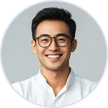 A man wearing glasses and a white shirt.