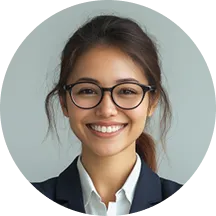 A woman with glasses smiling for the camera.
