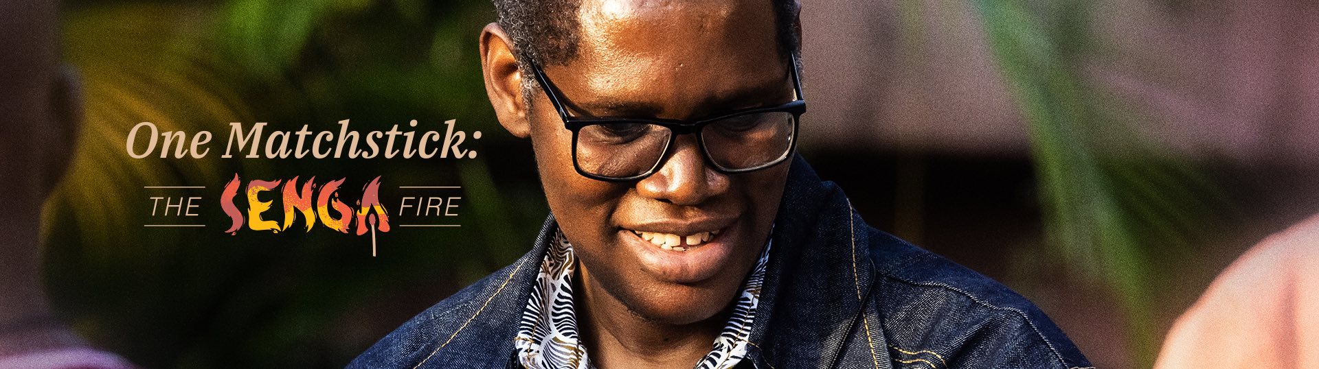 Woman with earphones listening to audio and looking at her smartphone