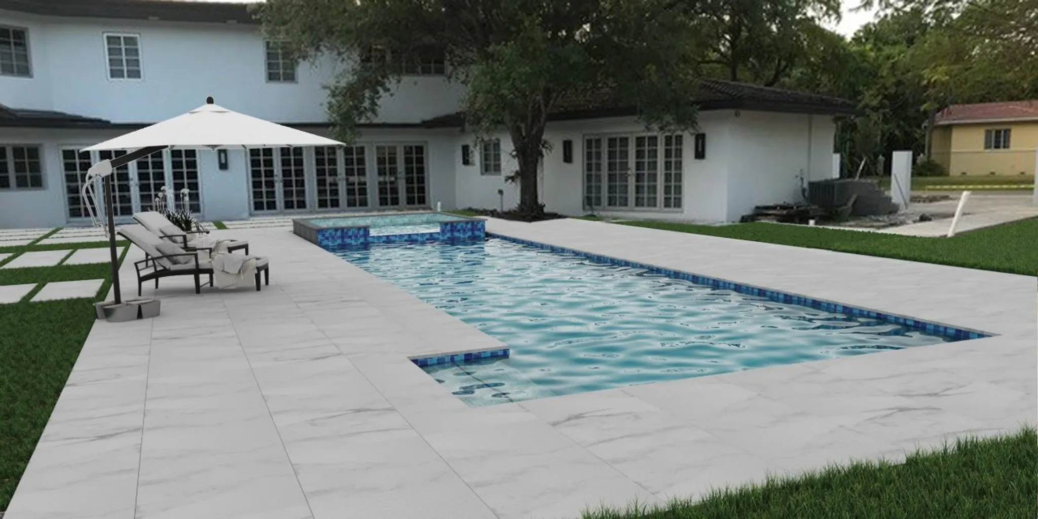 Wide porcelain pavers selected for a coordinated outdoor surface