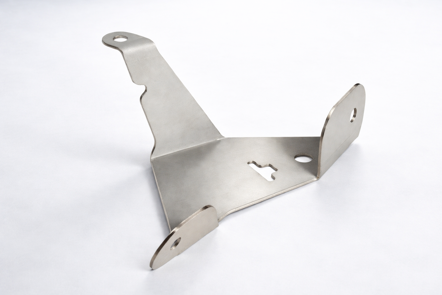 Triangular metal bracket with three mounting holes and a keyhole slot on a white background.
