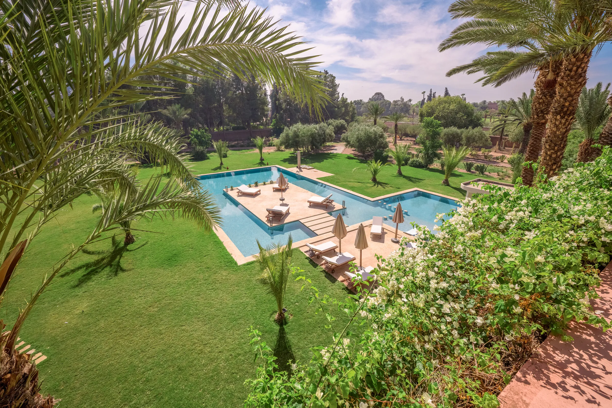 Pool and gardens of a private villa in the Palmeraie, Marrakech