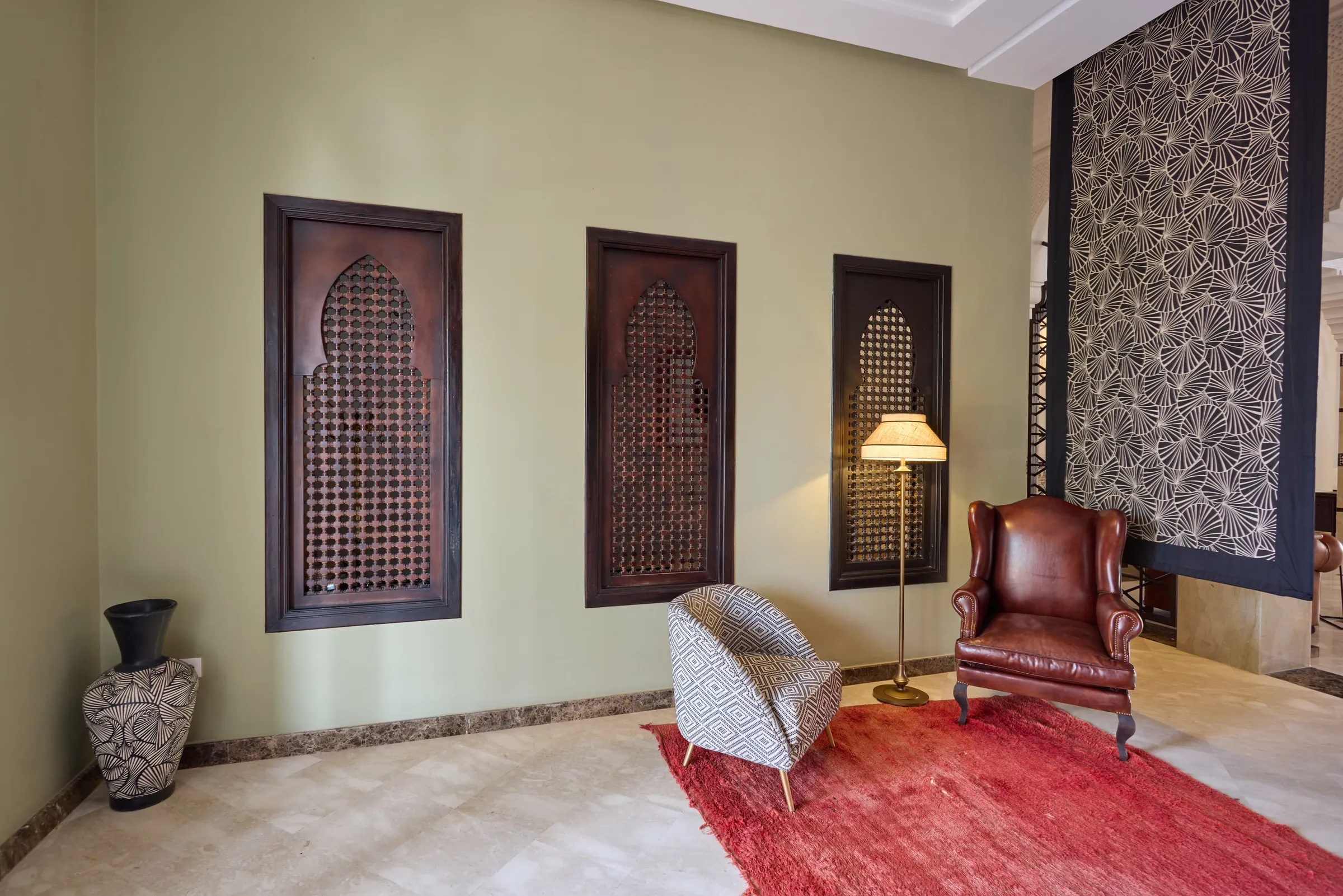 Lounge with carved panels in a private villa near Marrakech