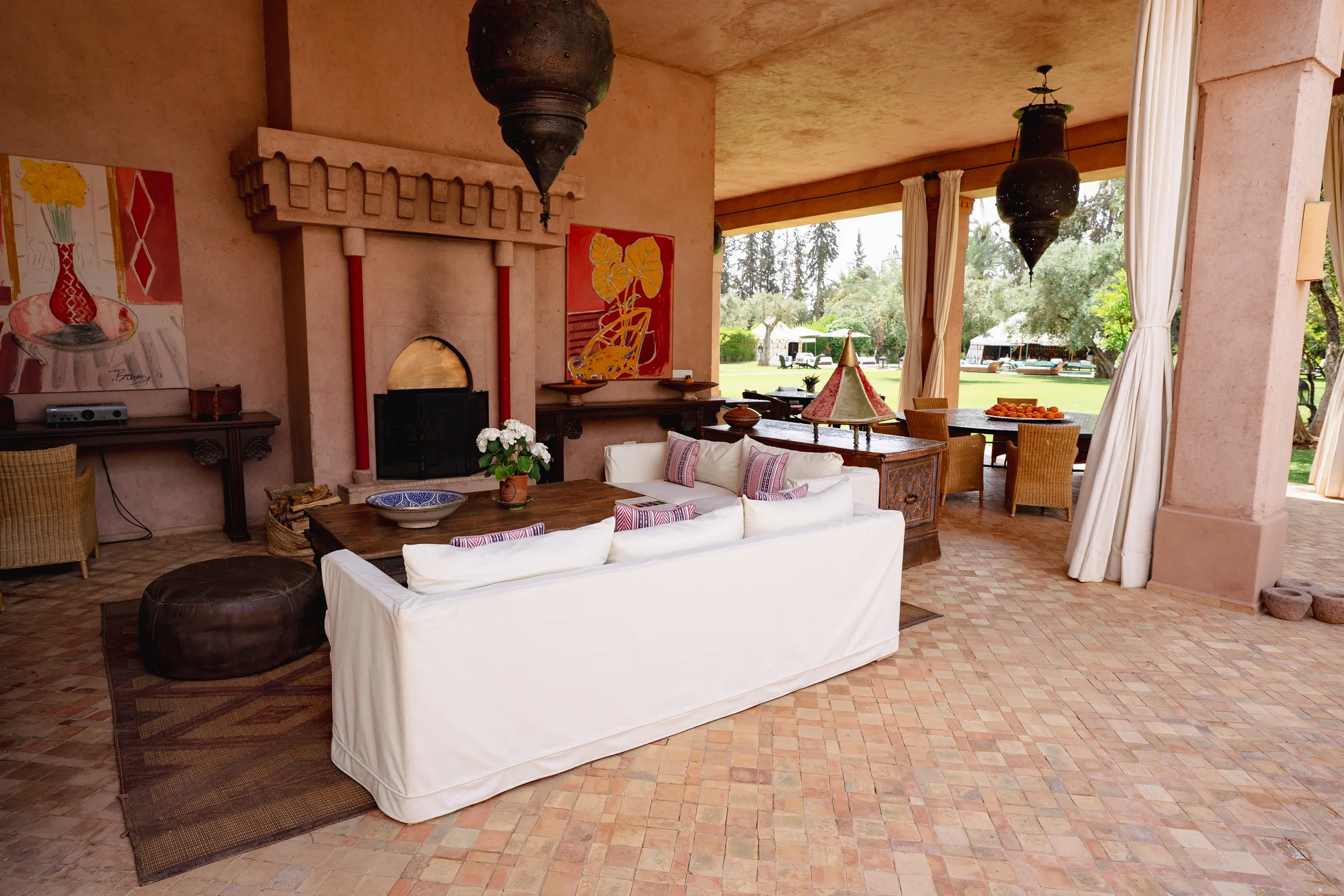 Covered terrace with fireplace at Ezzahra Estate