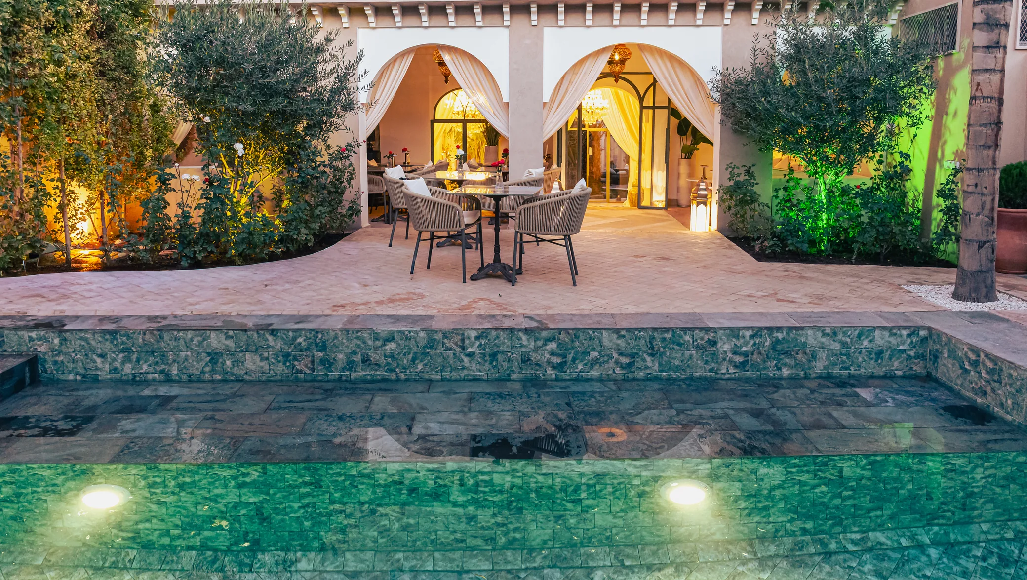 Kasbah Moon Marrakech — heated pool and dining terrace at dusk