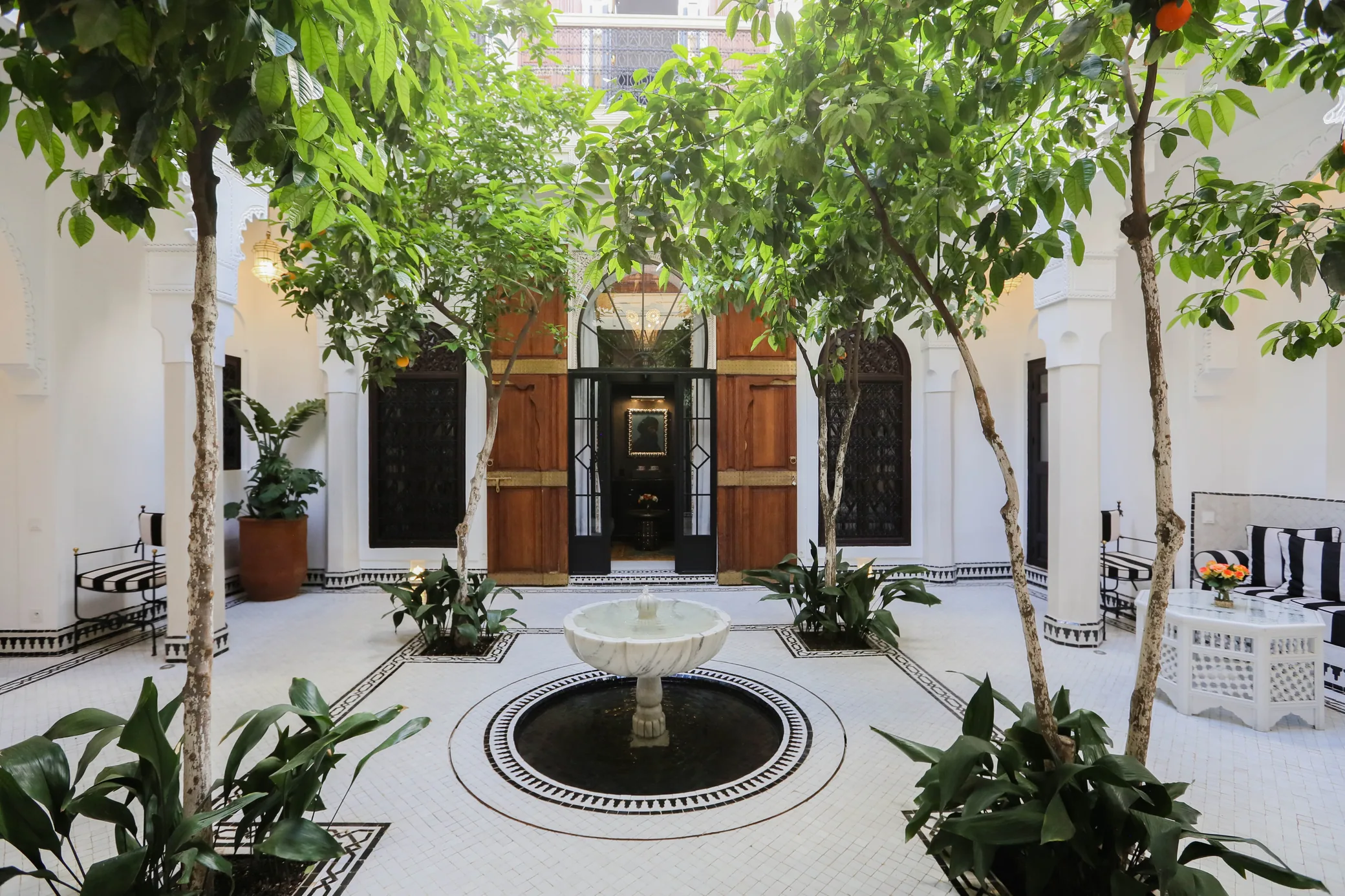 Riad Dar Saeed Marrakech — courtyard fountain at dusk
