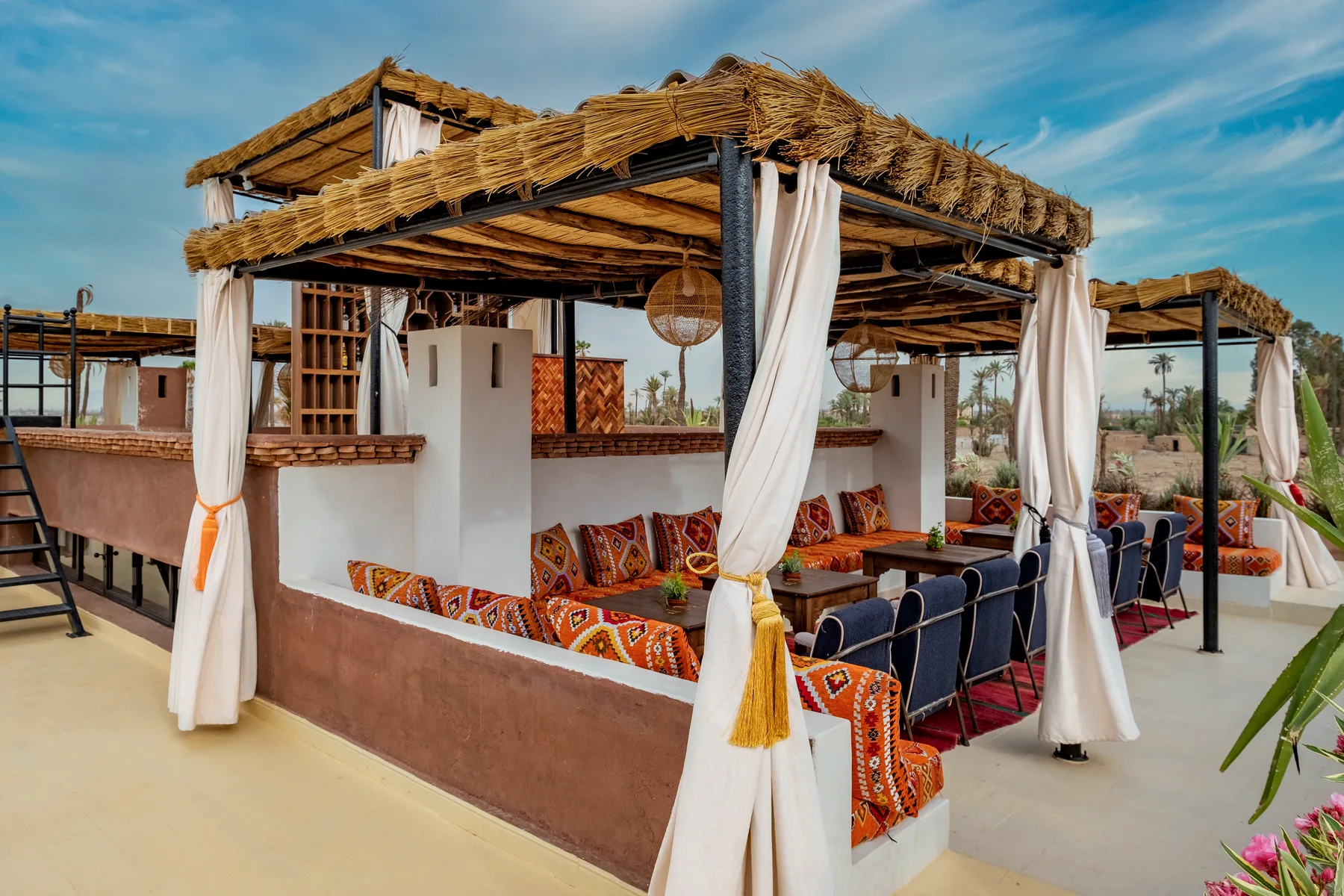 Villa Moira, celebration villa in the Palmeraie, Marrakech, rooftop canopy daybed. The Marrakech Curator.