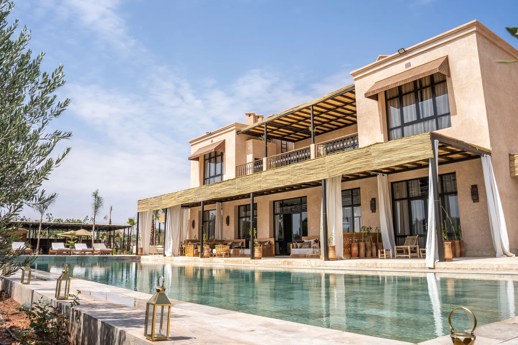 Villa Kallista, 12 bedroom wedding and event villa in Marrakech, contemporary facade and heated pool. The Marrakech Curator.