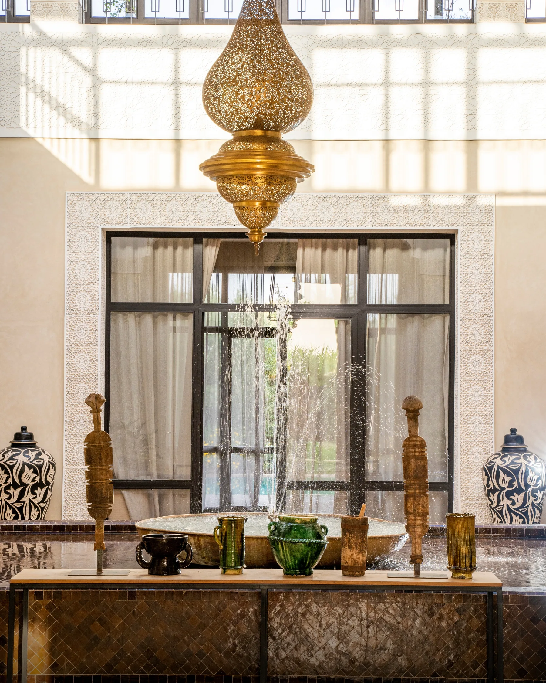 Villa Kallista, 12 bedroom wedding and event villa in Marrakech, interior fountain by the salon. The Marrakech Curator.