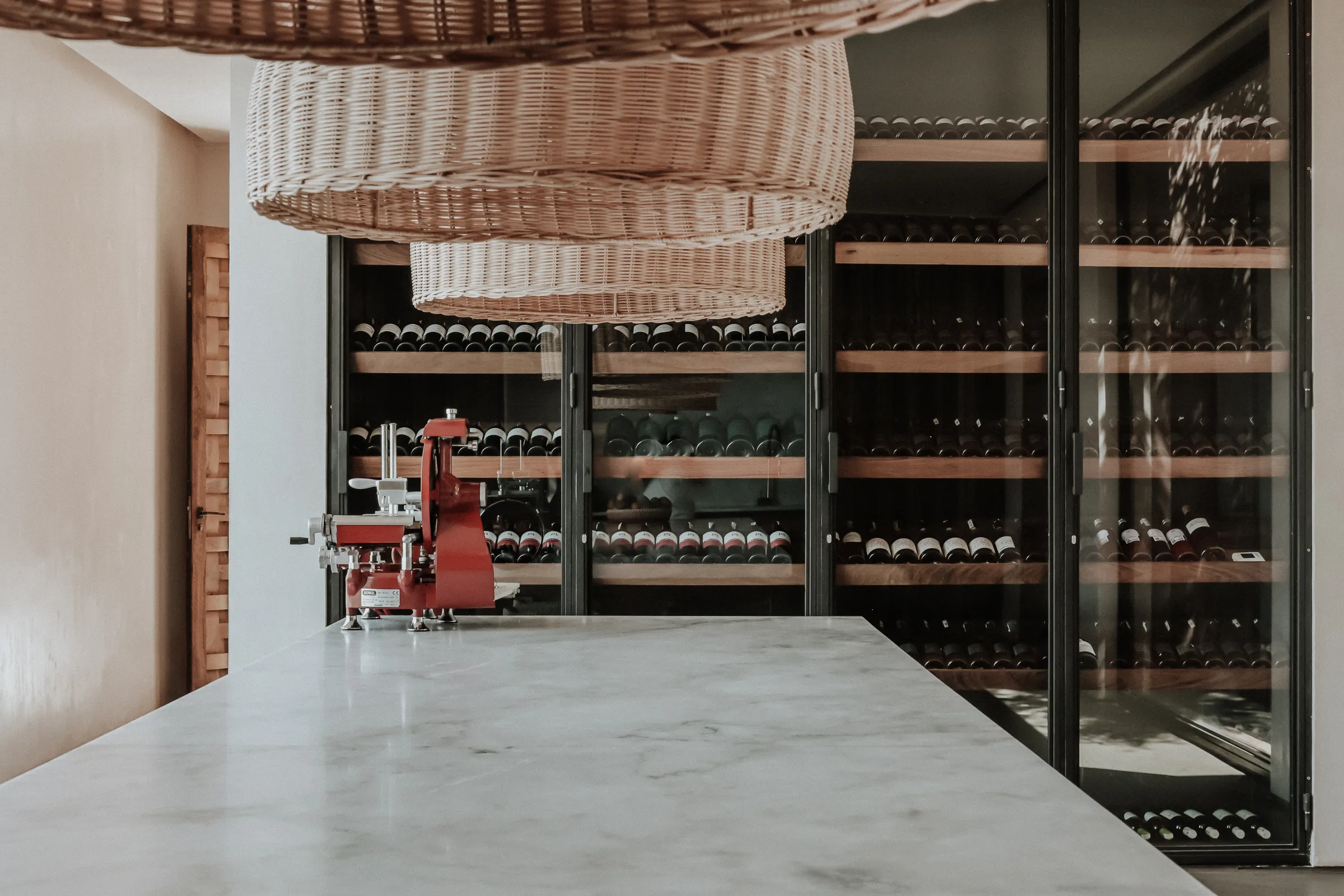 Villa Kalliope, private villa rental in the Palmeraie, Marrakech: kitchen and glass wine cellar
