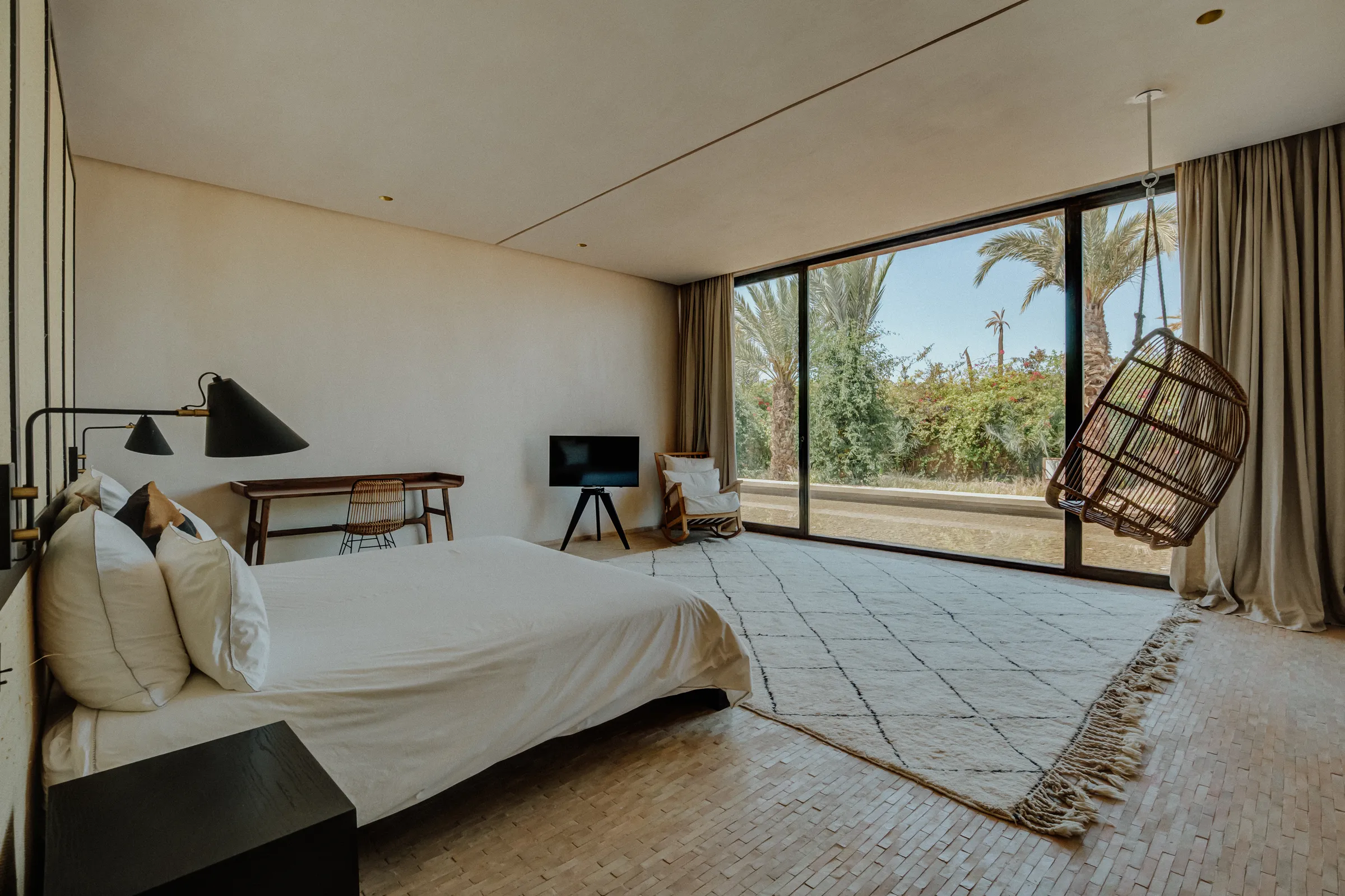 Villa Kalliope, private villa rental in the Palmeraie, Marrakech: bedroom opening onto the garden