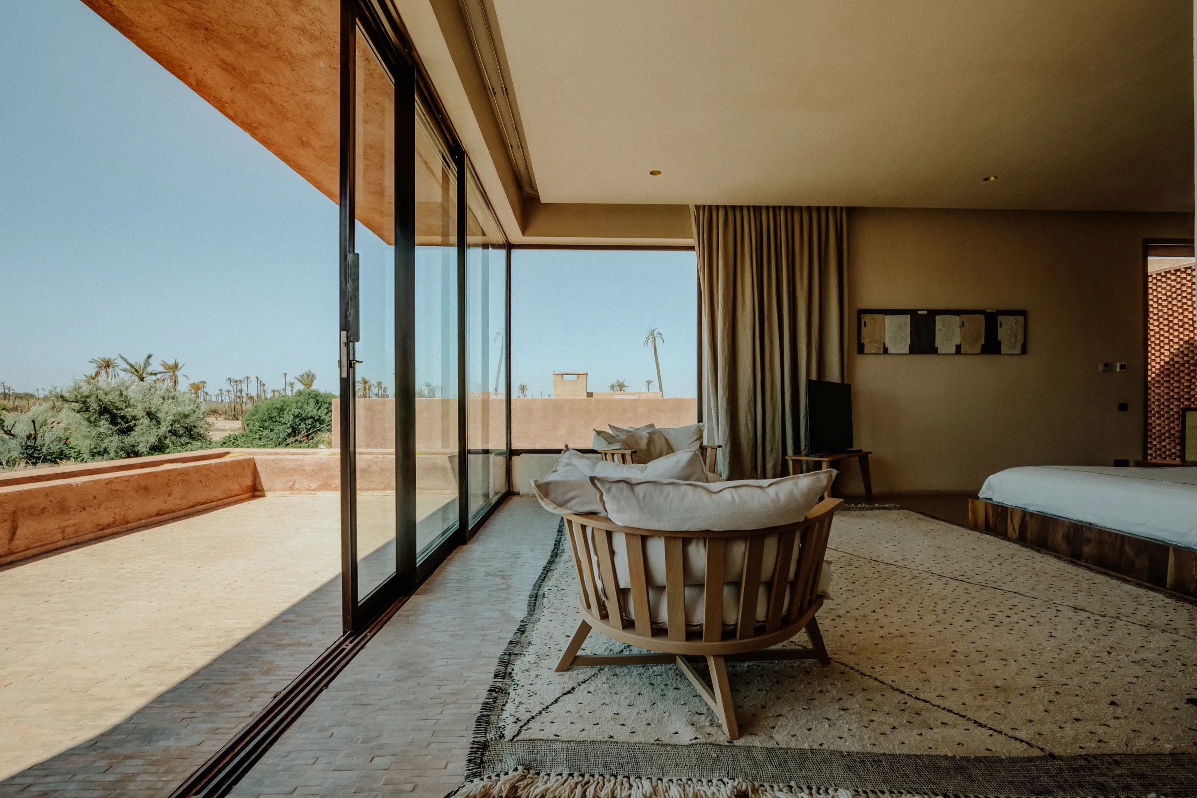 Villa Kalliope, private villa rental in the Palmeraie, Marrakech: bedroom with private terrace
