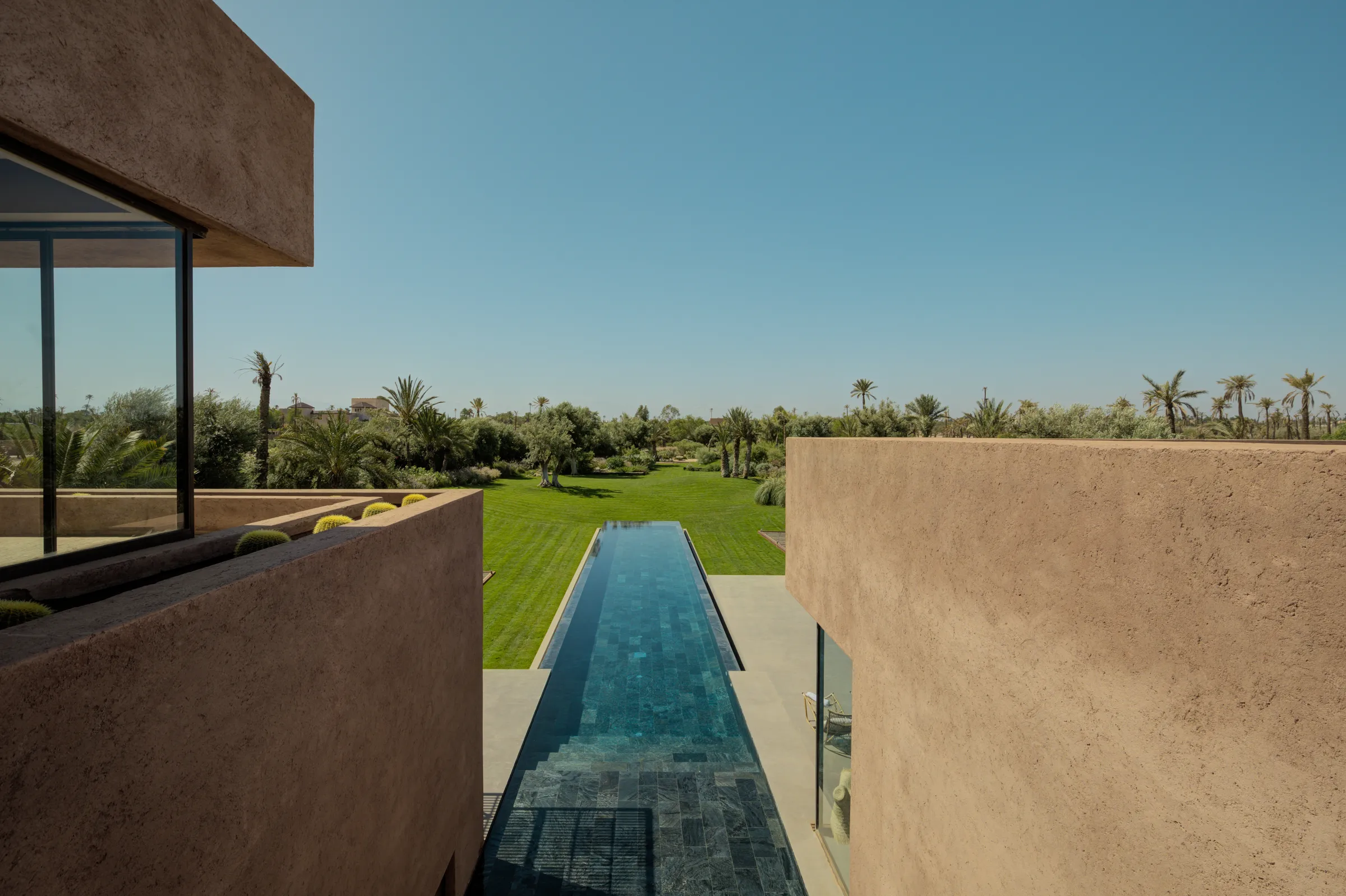 Villa Kalliope, private villa rental in the Palmeraie, Marrakech: pool seen from the terrace
