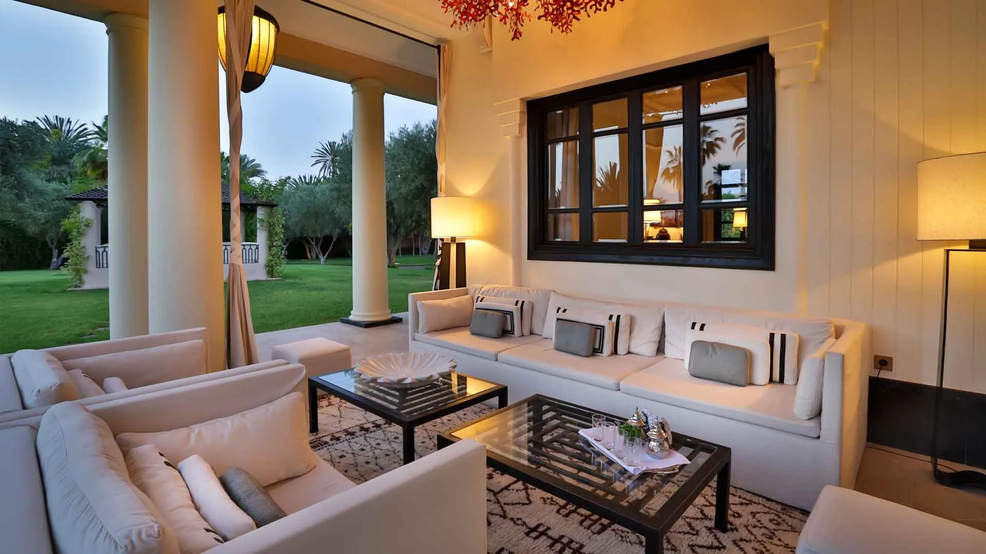 Villa Olympia, private villa rental in Bab Atlas, Marrakech: covered lounge opening onto the garden