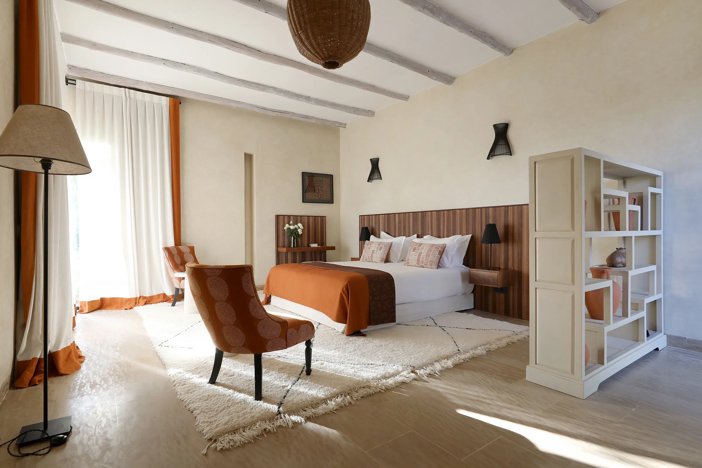 Villa Eos, private villa rental in the Palmeraie, Marrakech: suite with reading corner and bookshelves
