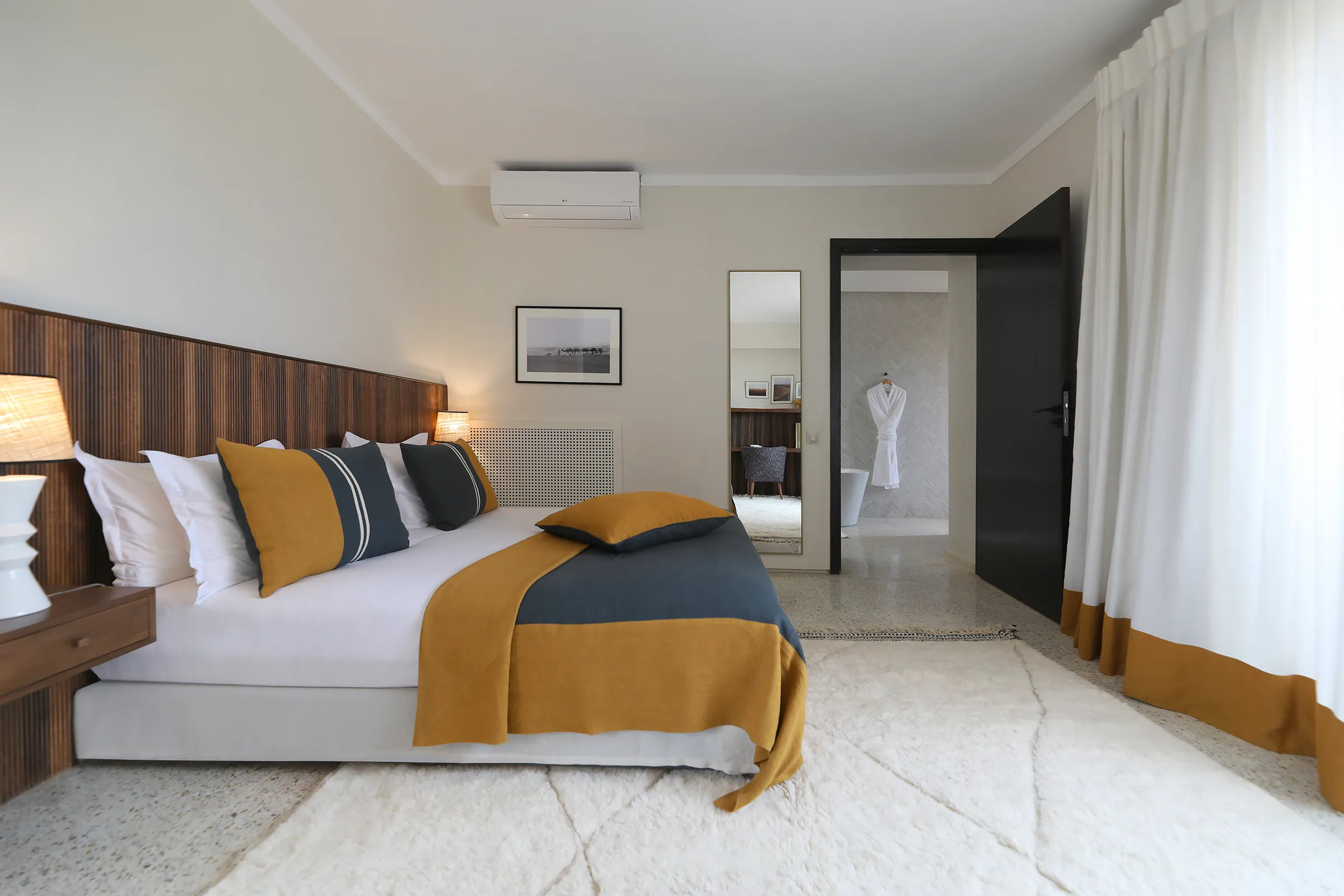 Villa Eos, private villa rental in the Palmeraie, Marrakech: suite in ochre tones