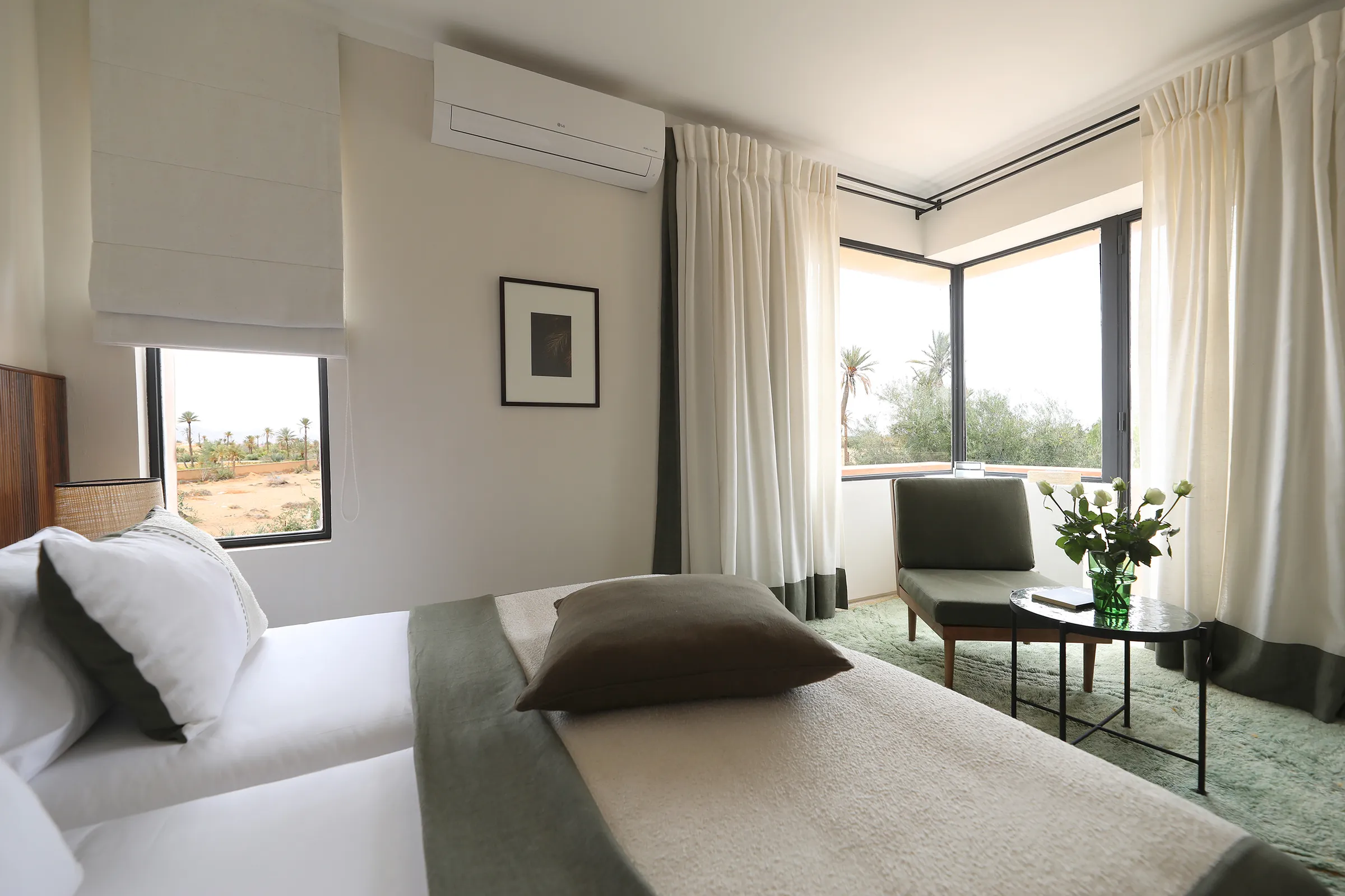 Villa Eos, private villa rental in the Palmeraie, Marrakech: suite with corner windows