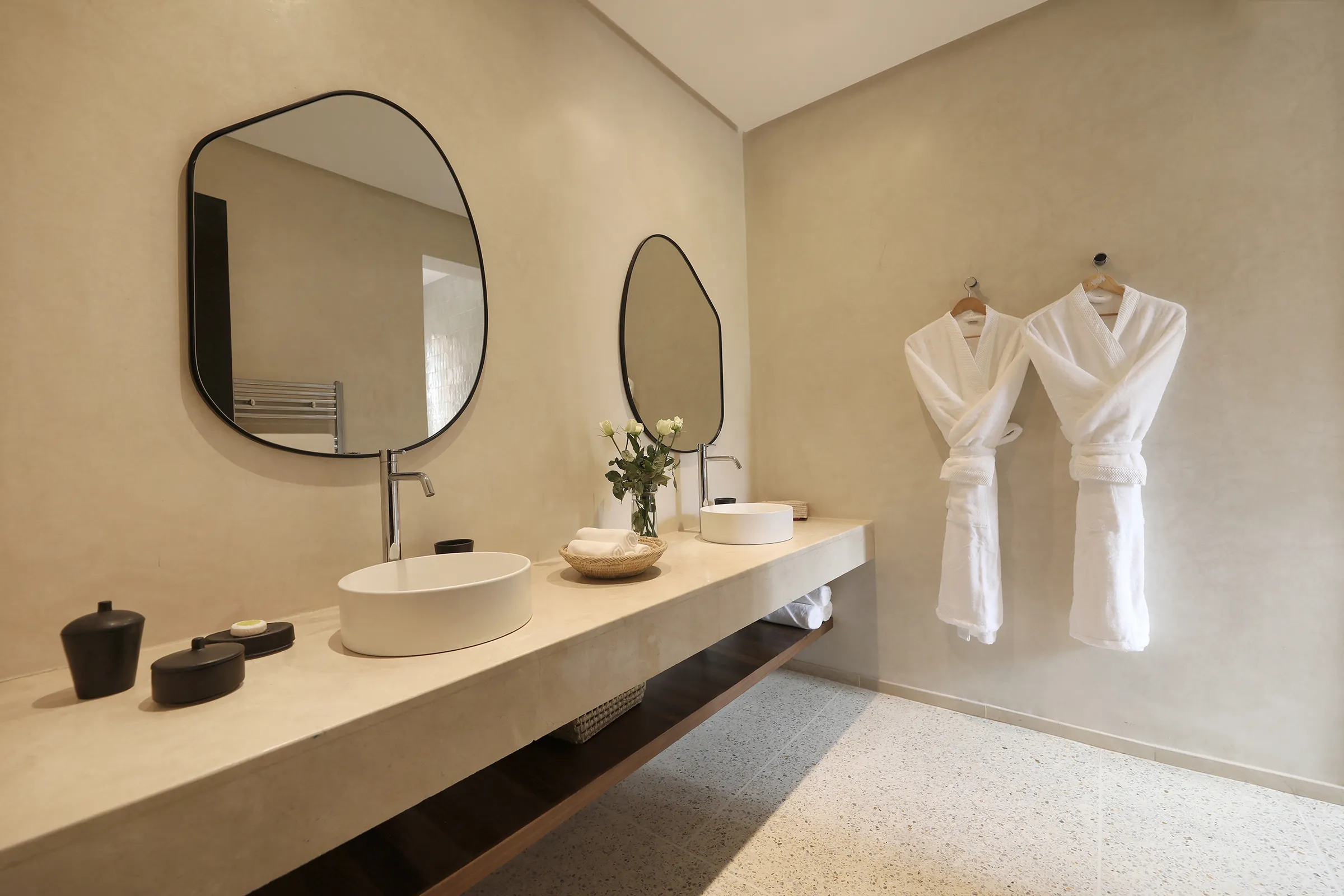 Villa Eos, private villa rental in the Palmeraie, Marrakech: bathroom with stone basin