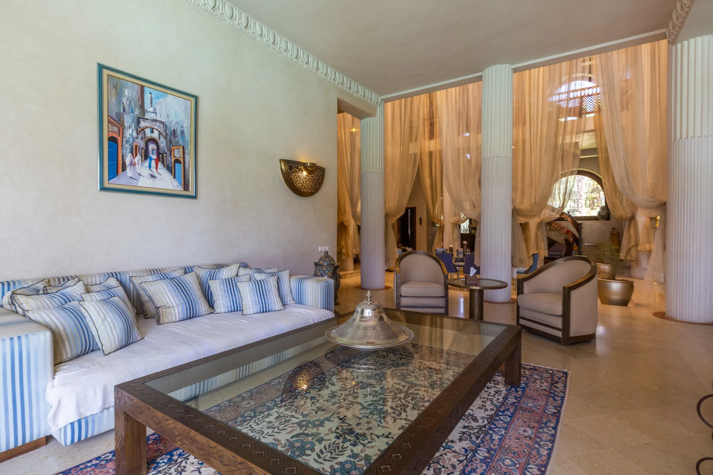 Villa Aegea, private villa rental in the Palmeraie, Marrakech: lounge with white sofas