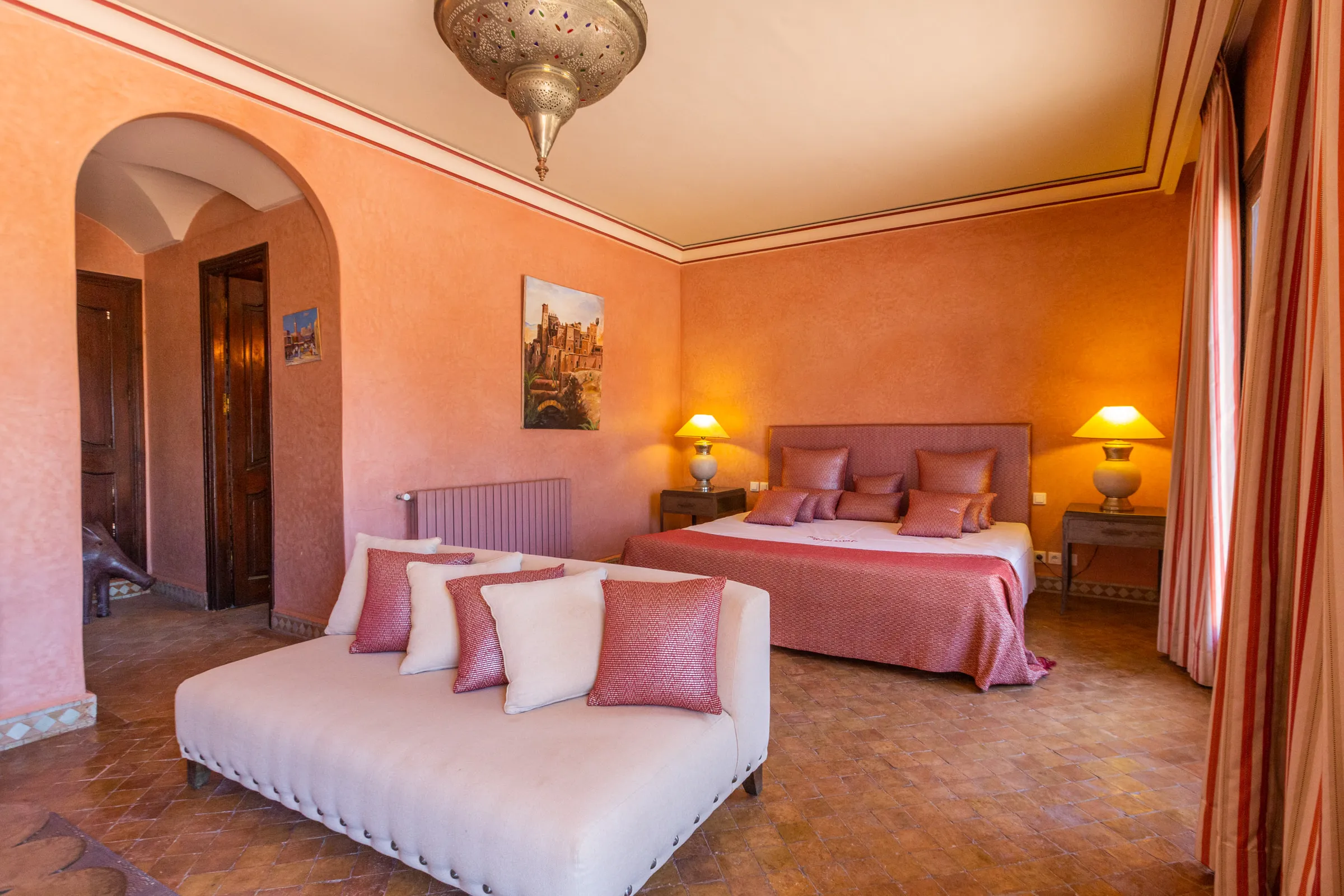 Villa Aegea, private villa rental in the Palmeraie, Marrakech: pink suite with sitting area