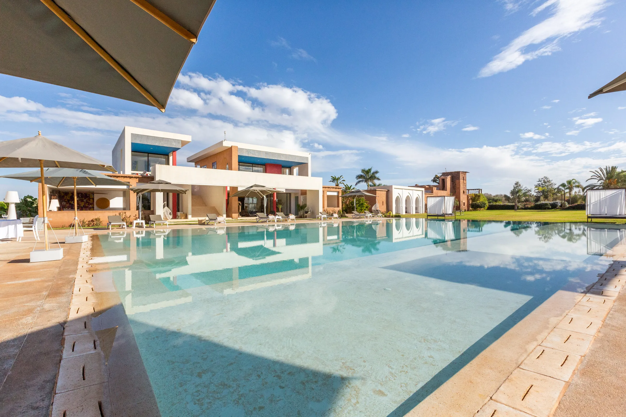Villa Chloé, private estate rental in Sidi Abdellah Ghiat, Marrakech: long pool in front of the villa