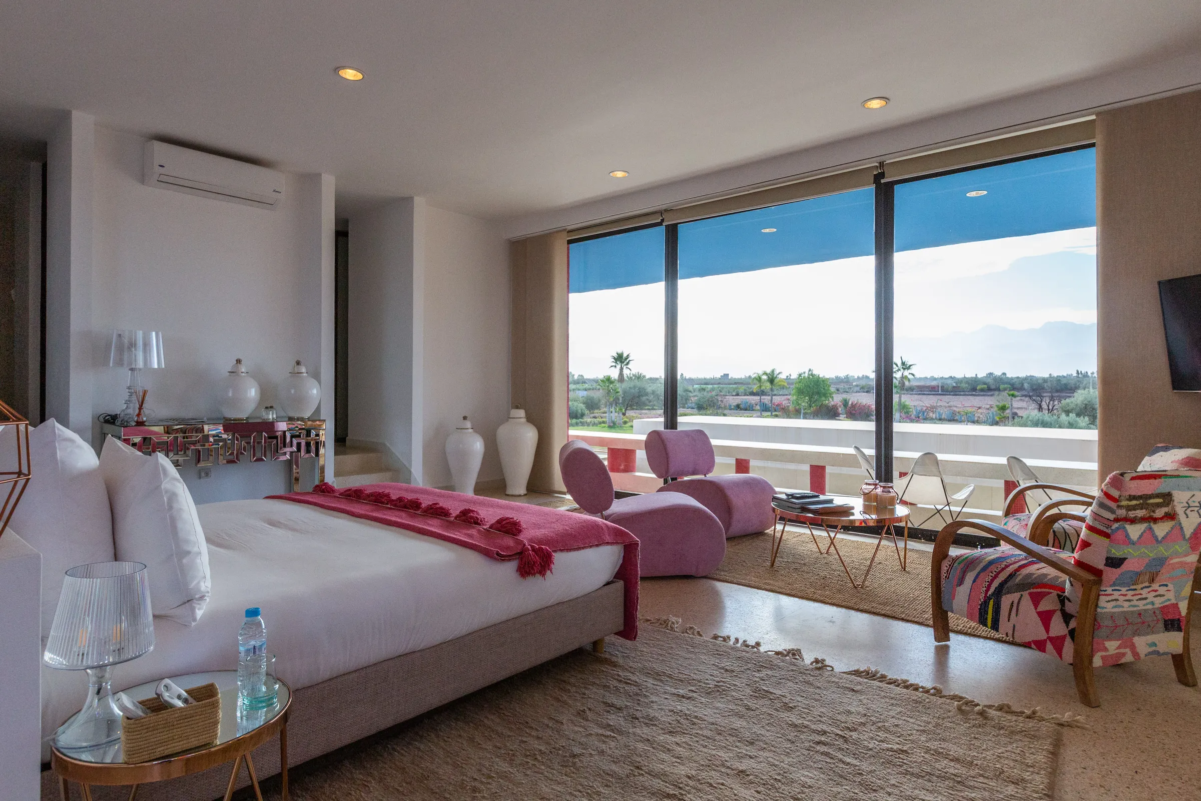 Villa Chloé, private estate rental in Sidi Abdellah Ghiat, Marrakech: suite with panoramic windows