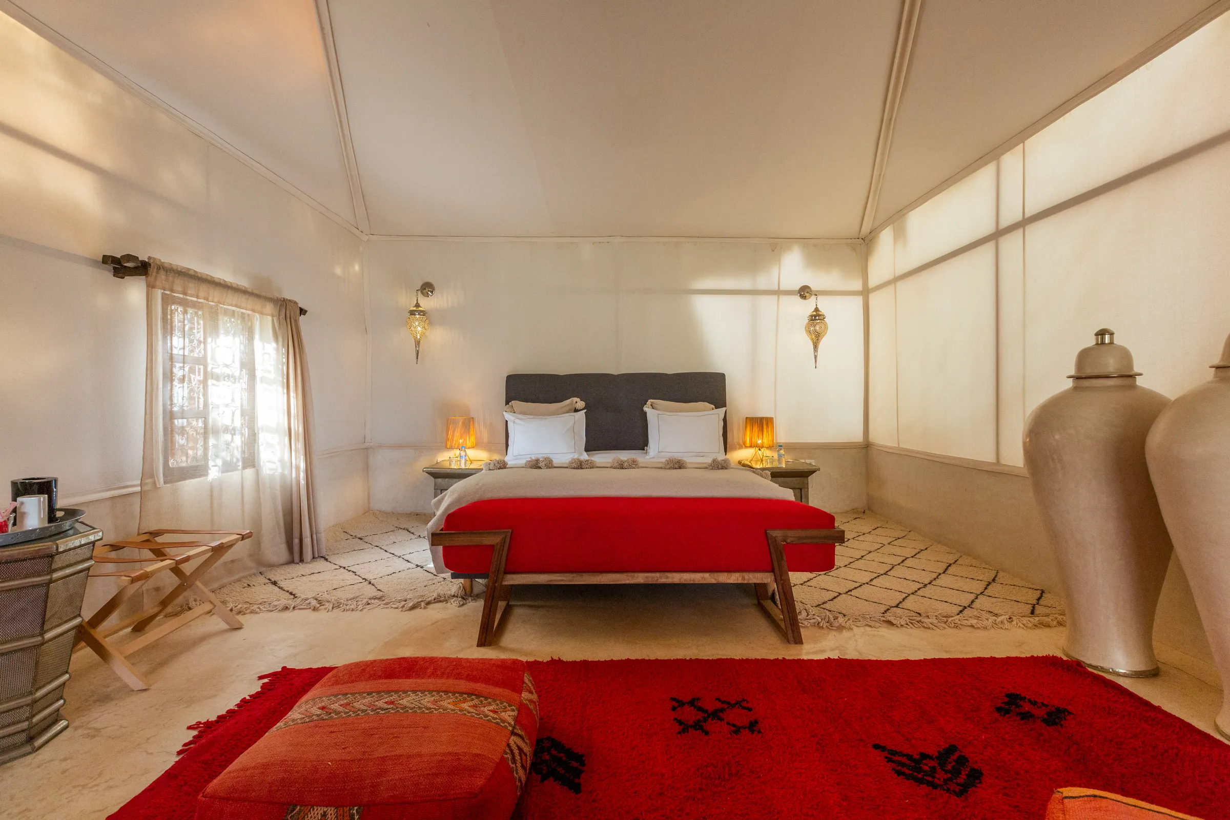 Villa Chloé, private estate rental in Sidi Abdellah Ghiat, Marrakech: kasbah suite with red rug