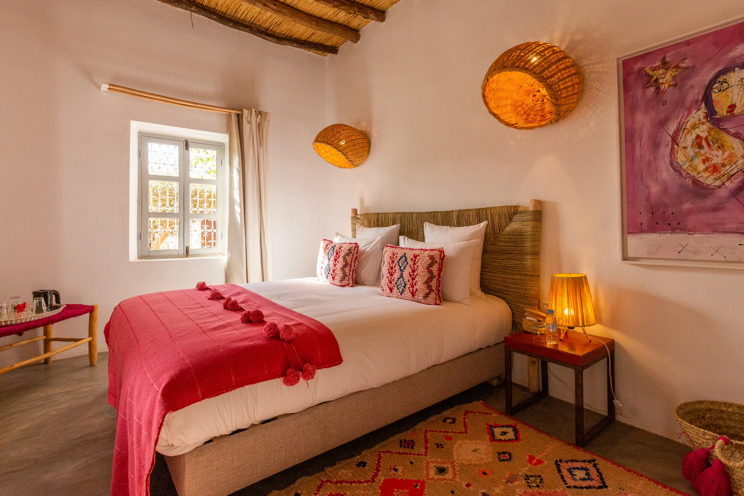 Villa Chloé, private estate rental in Sidi Abdellah Ghiat, Marrakech: bedroom with red accents