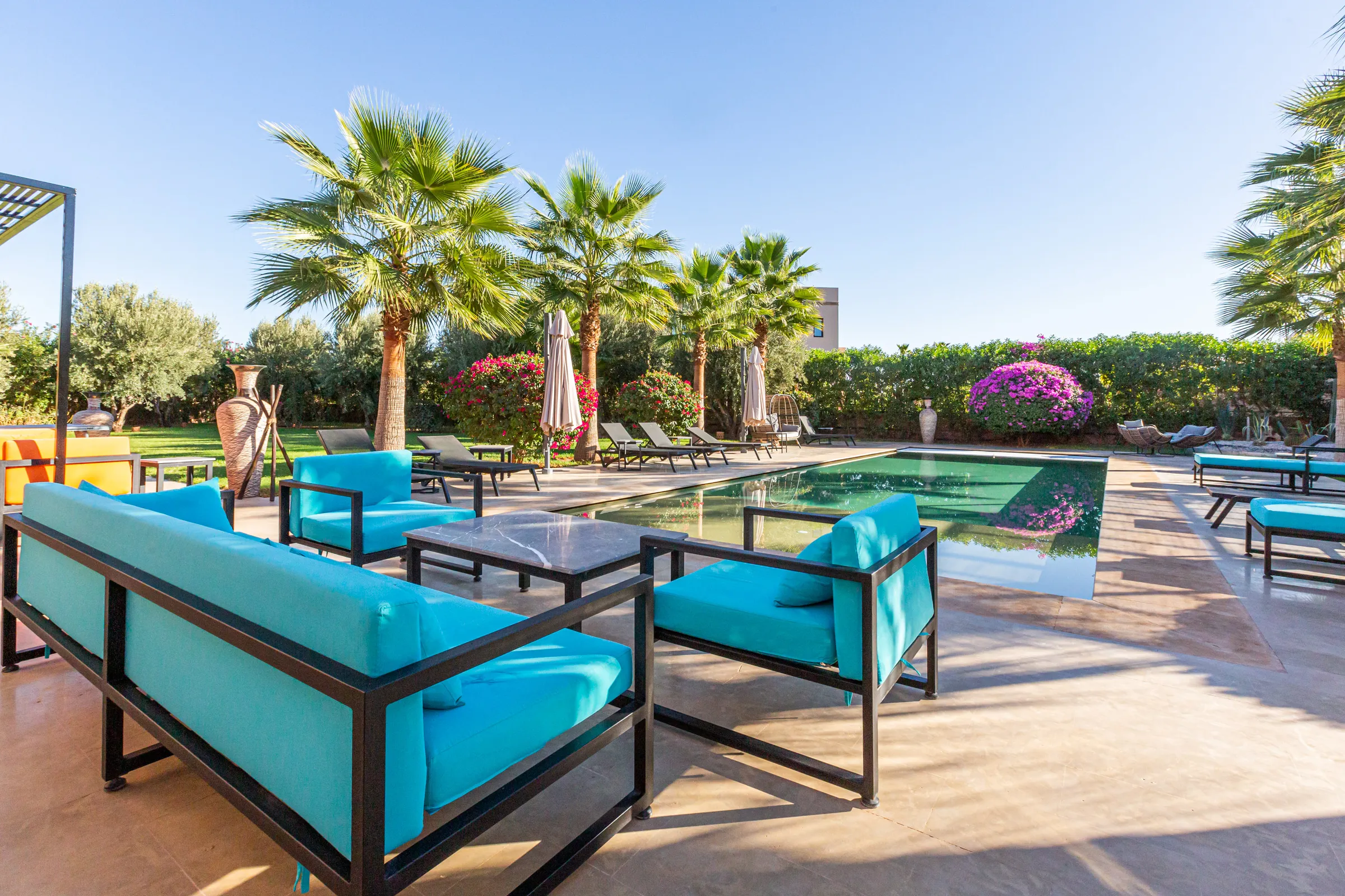 Villa Maia, private villa rental on the Route de Fès, Marrakech: outdoor lounge by the pool