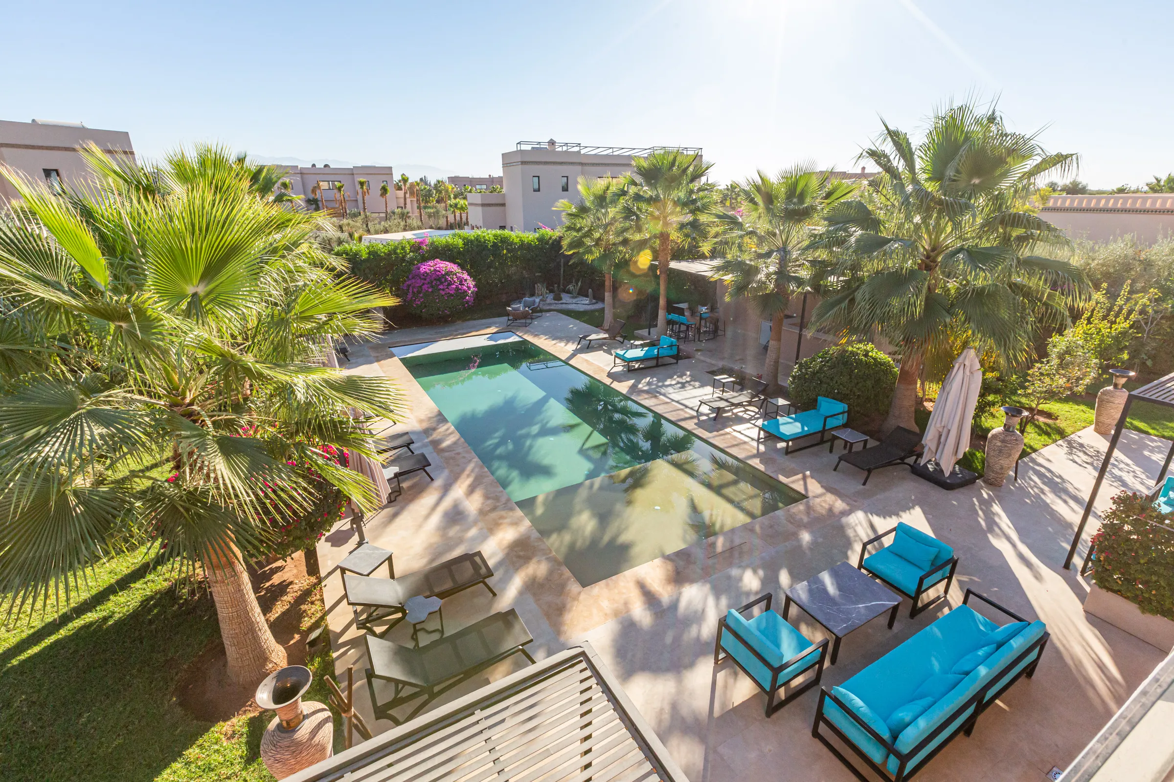 Villa Maia, private villa rental on the Route de Fès, Marrakech: view over the pool and garden
