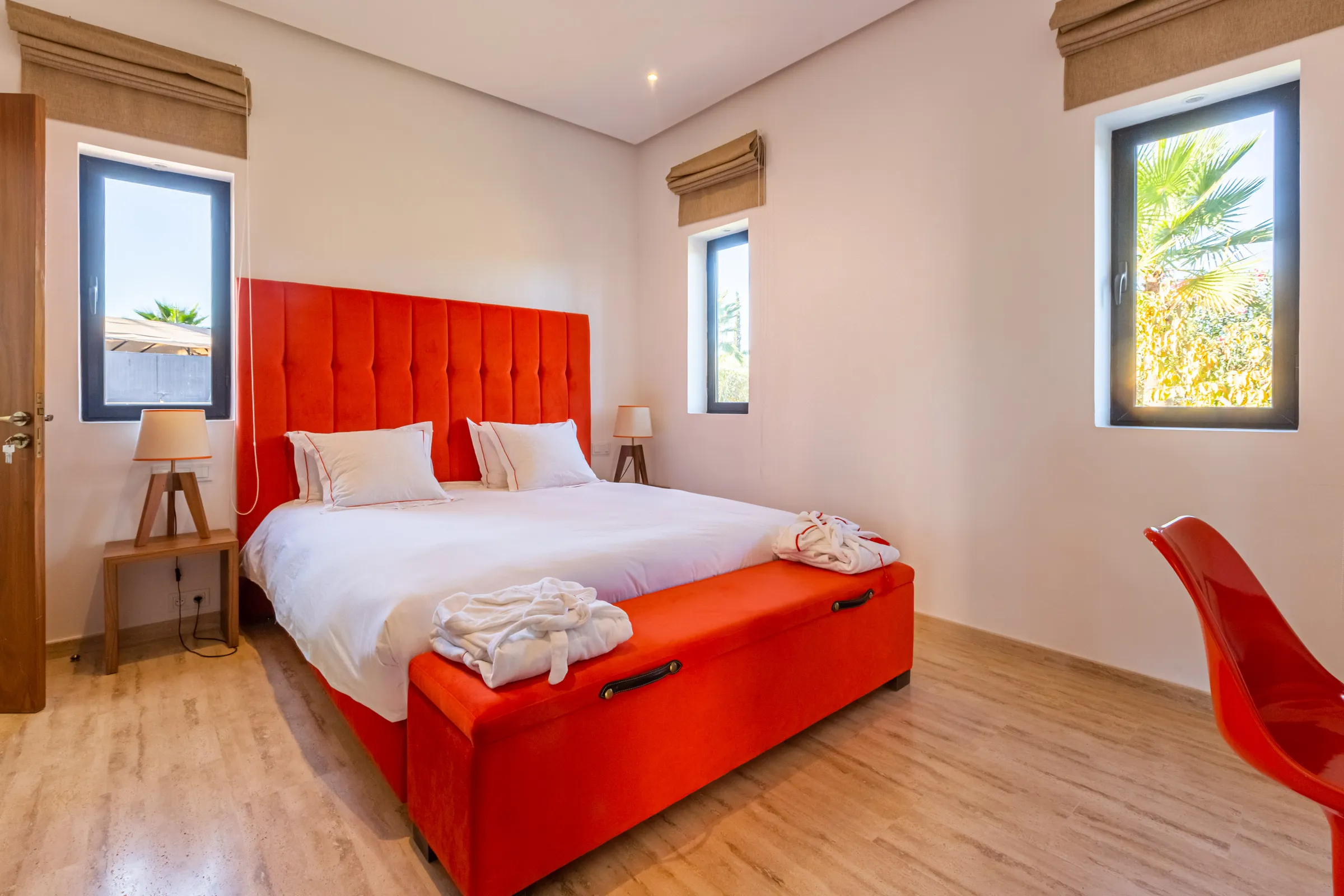 Villa Maia, private villa rental on the Route de Fès, Marrakech: suite with red headboard