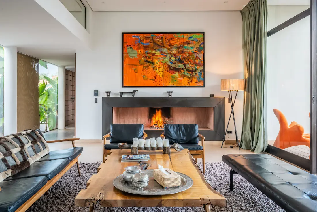 Villa Althea, private villa rental in Bab Atlas, Marrakech: lounge with fireplace